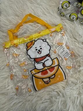 BT21 RJ Jin holding an orange slice clear tote makeup pencil pouch bag zipper